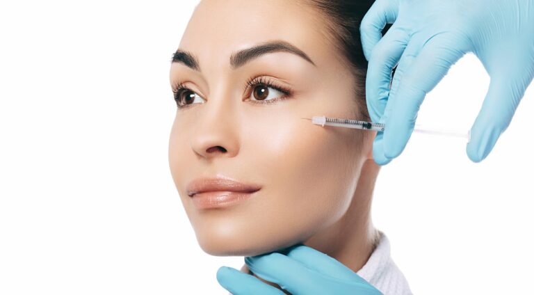 injecting a filler during the vampire facelift